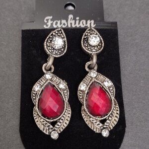 Fashion earrings with red gems and rhinestones.
